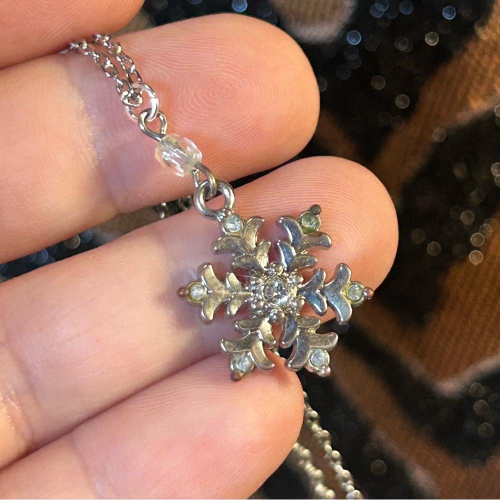 Handcrafted faceted clear rhinestone accent snowflake pendant on chain necklace
